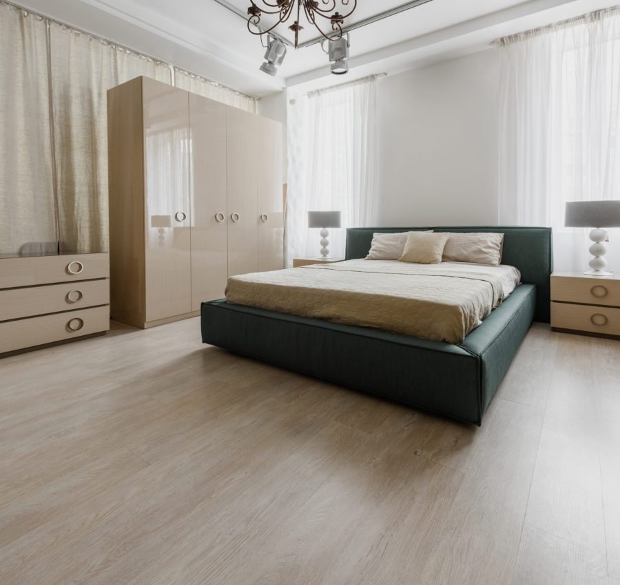 Large bed in modern renovated bedroom